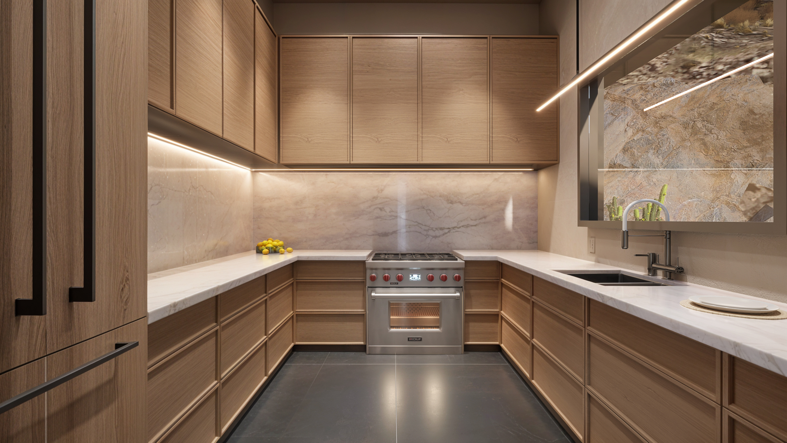 Butler's kitchen with a Wolf gas range, book-matched marble backsplash and a framed window onto the rock face