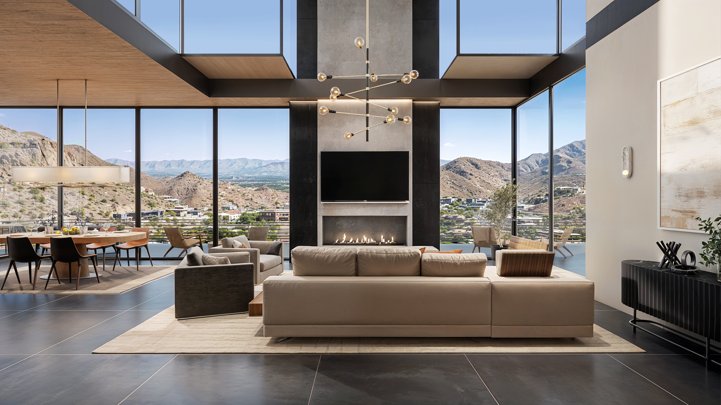 Grand living room with linear fireplace looking out toward Camelback Mountain and the Paradise Valley desert