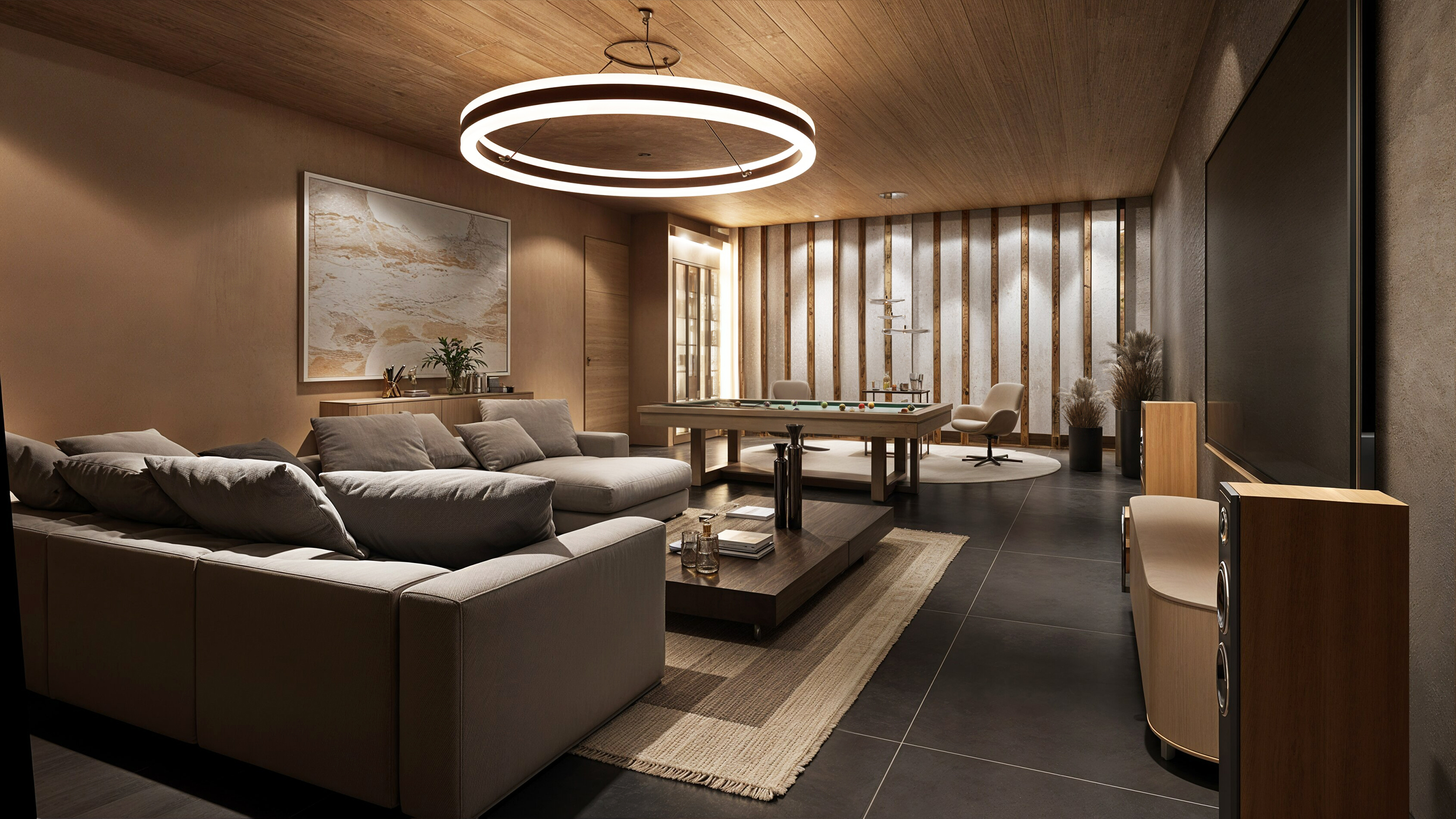 Long view through the lounge — sofa in foreground, pool table and reeded backlit feature wall in the distance