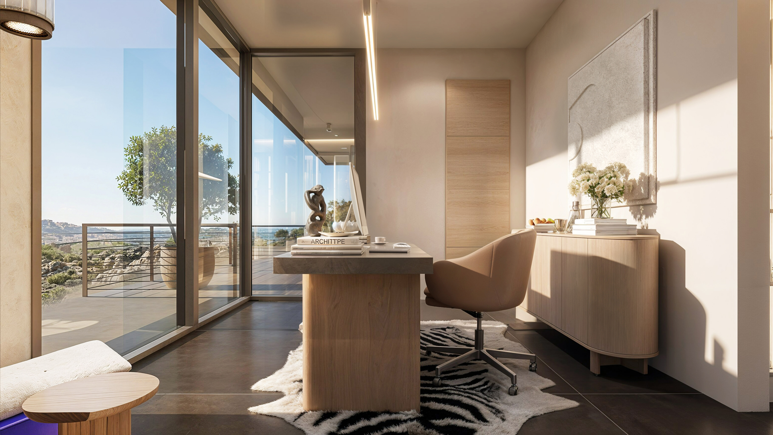 Home office at the corner of the upper level, opening to a terrace with views of the McDowell Mountains